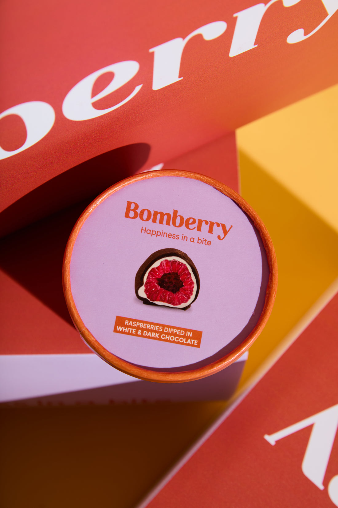 Bomberry | Frozen raspberries dipped in Belgian chocolate