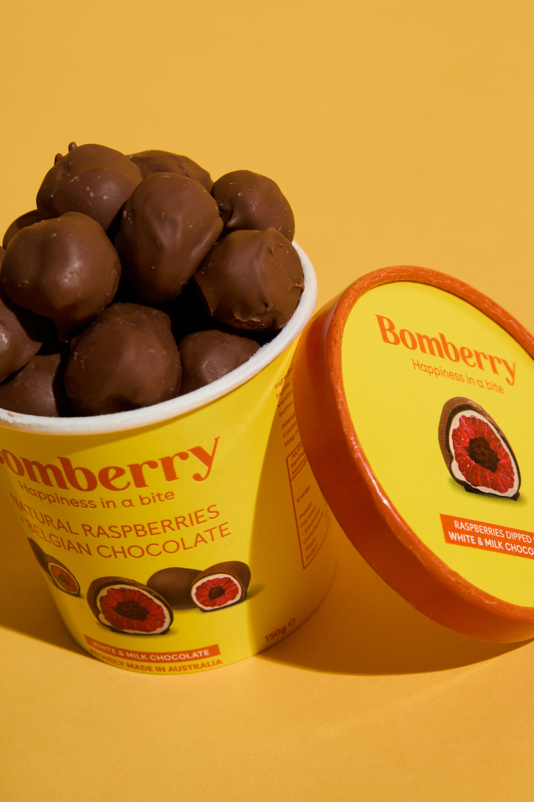 Bomberry | Frozen raspberries dipped in Belgian chocolate