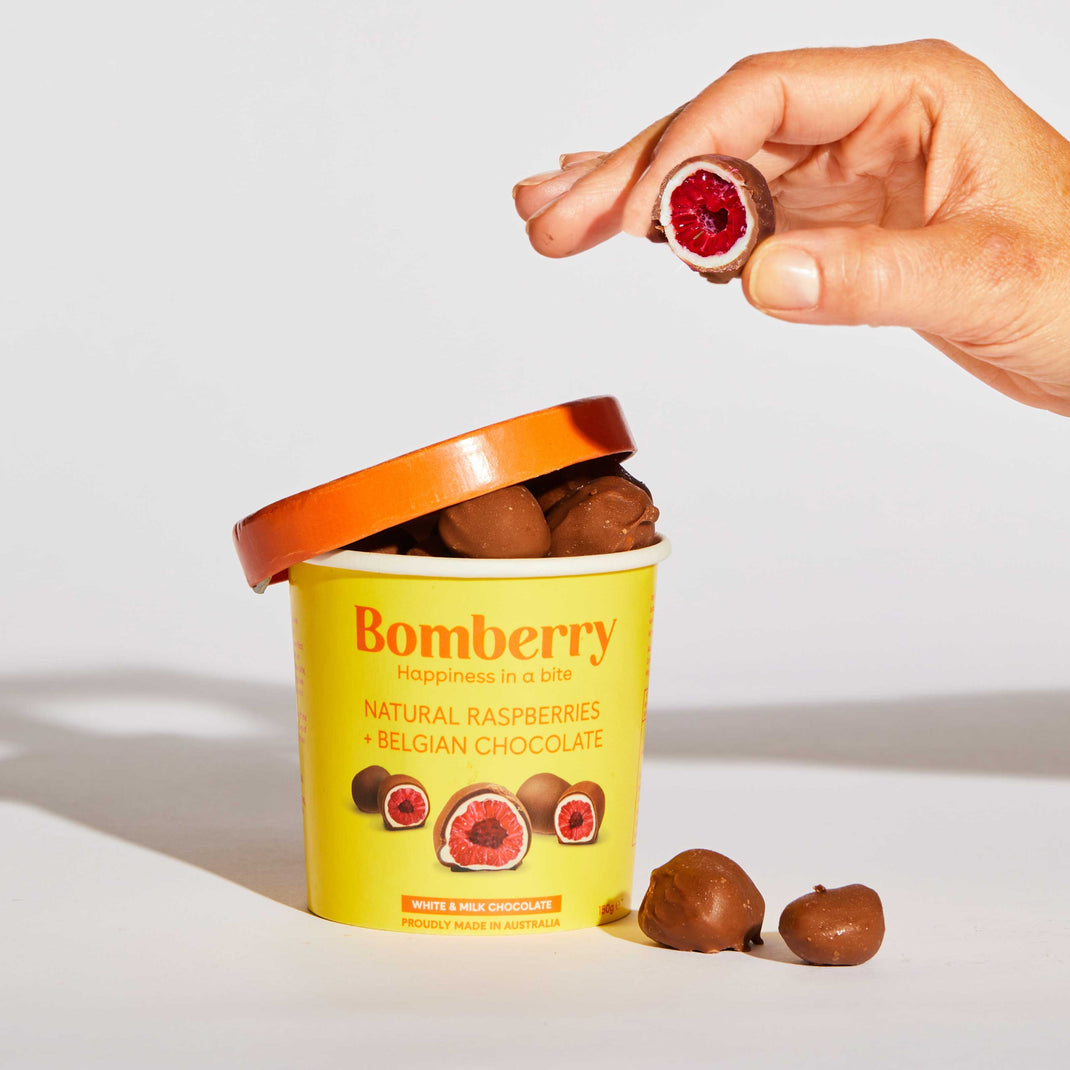 Bomberry | Frozen raspberries dipped in Belgian chocolate